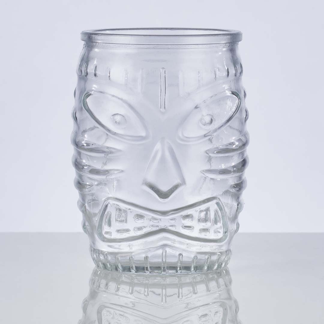 Barrel style 16oz tiki glass for cocktails on a white background.