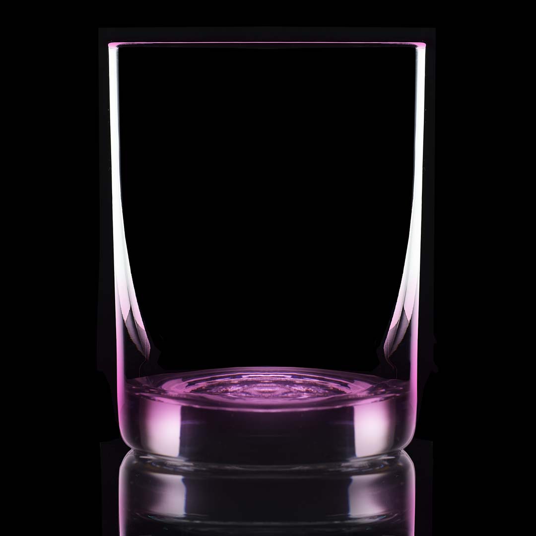 11.75 oz purple bottom glass on a black background and backlit.