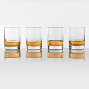 set of four unique double old fashioned glasses. All hand cut with a heavy base.