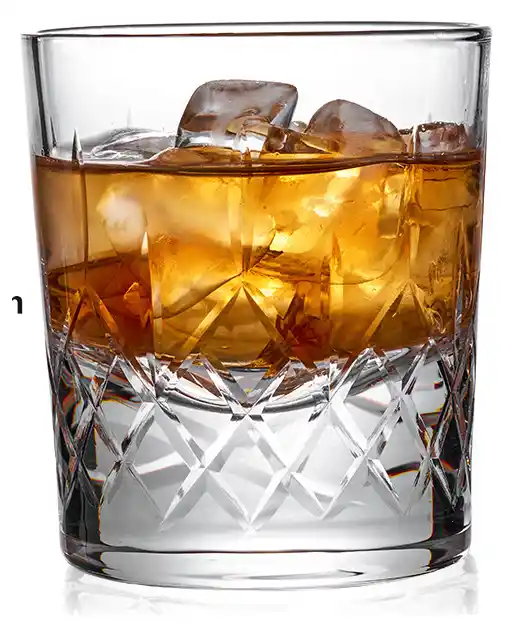 old fashioned whiskey glass with hand cut diamond pattern.