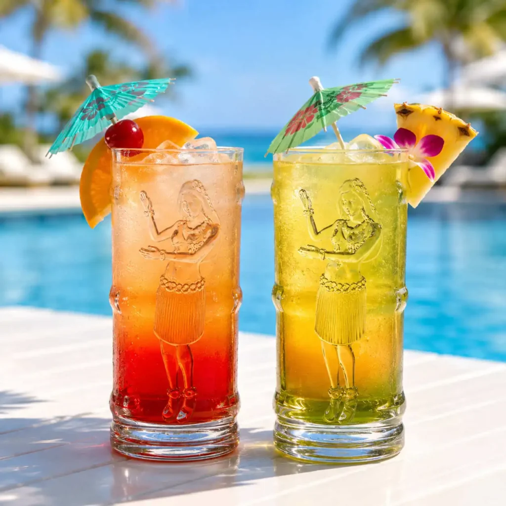 Pair of hula girl tiki glasses with 3D embossed dancer holding tropical cocktails